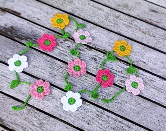 Crochet mini garland with 10 small colorful flowers yellow pink white