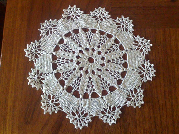Natural white crocheted decorative cover for table decoration