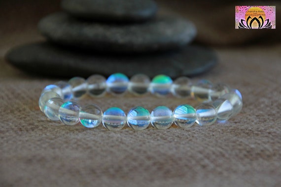 Plus Value Titanium Aura Quartz - Blue Firing Bracelet for Vastu Feng Shui  Chakra Aura Personal Reiki Healing Crystals (Beads Size 8mm, Jute Bag) :  Amazon.in: Health & Personal Care