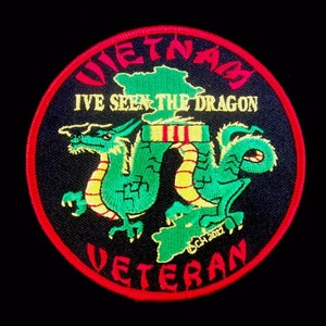 May include: A black and red embroidered patch with a green dragon and the text "Vietnam I've Seen The Dragon Veteran".