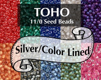 May include: A collection of TOHO 11/0 seed beads in various colors including red, green, blue, white, purple, orange, silver, and pink. The text TOHO 11/0 Seed Beads and Silver/Color Lined is displayed over the multicolored bead background.