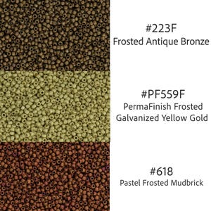 May include: Close-up of three sections of small, round beads in various colors. The top section is Frosted Antique Bronze, the middle is PermaFinish Frosted Galvanized Yellow Gold, and the bottom is Pastel Frosted Mudbrick.