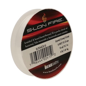 May include: A spool of S-Lon Fire braided and fused bead thread in crystal color. The label displays the product name, a barcode, 0.005 inch diameter, 15 yards length, and 4 pound test strength. The Beadsmith logo is printed at the bottom.
