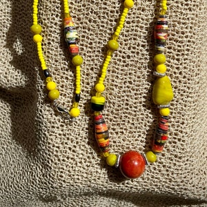 Vibrant yellow and orange paper bead necklace | Assorted random bead necklace in bright yellow