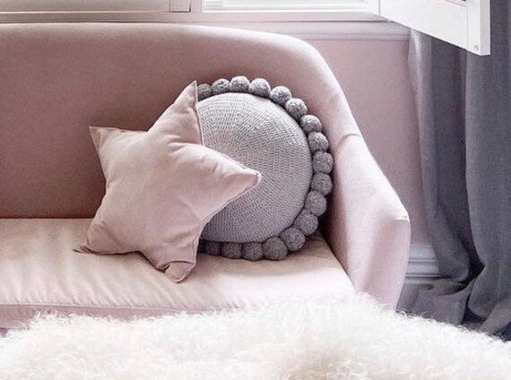 round grey cushion
