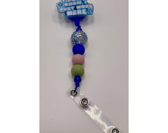 Porta badge retrattile con perline "Non lo so, lavoro qui e basta"