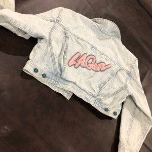 Vintage LA Gear 1990's denim jean jacket in an acid wash with textured logo patches image 2