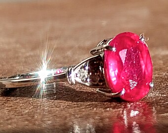 Natural African Ruby Solitaire with White Diamond accents in 9K White Gold UK P