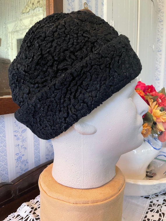 Black winter hat sales with ear flaps