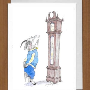 May include: An illustrated greeting card featuring a goat in blue clothing gazing up at a tall grandfather clock. The clock is brown with a white clock face. The goat is wearing a blue jacket and pants.