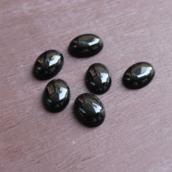 Natural Black Onyx oval shape flat back cabochon calibrated for bezel setting available in all sizes 4x6 5x7 6x8 7x9 8x10 9x11 10x12 10x14