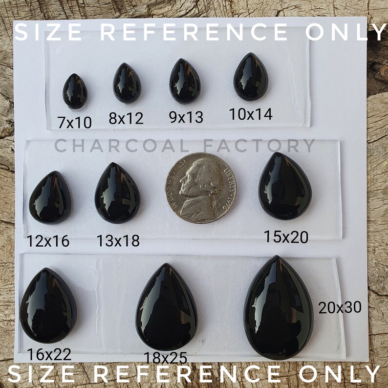 May include: Size reference chart for black teardrop shaped gemstones. The chart shows the size of the gemstones in inches, with a US quarter coin for scale. The text "SIZE REFERENCE ONLY" appears at the top and bottom of the chart.