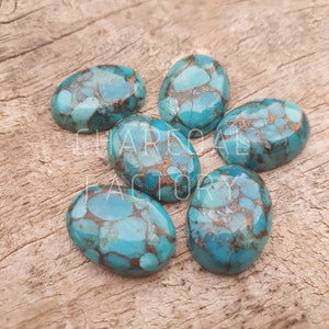 May include: Six oval-shaped turquoise cabochons with copper inclusions. The cabochons are a vibrant blue-green color and have a mottled pattern.