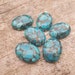 see more listings in the Oval cabochon section