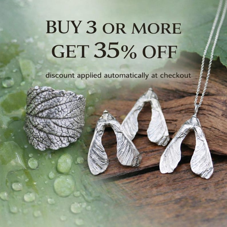 May include: A silver ring with a textured leaf pattern, two silver maple seed earrings, and a silver maple seed pendant on a chain. The text reads: BUY 3 OR MORE GET 35% OFF, discount applied automatically at checkout.