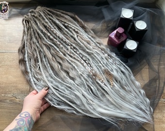 Mix natural look synthetic + braids + ombre curls light brown medium brown on shades of gray bandage, metal skulls raven feathers as a gift