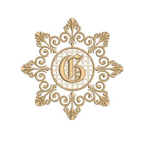 May include: Gold-coloured decorative emblem with an ornate, star-like design. The emblem features a central circle with the letter "G" and is surrounded by intricate scrollwork and floral patterns, set against a white background.