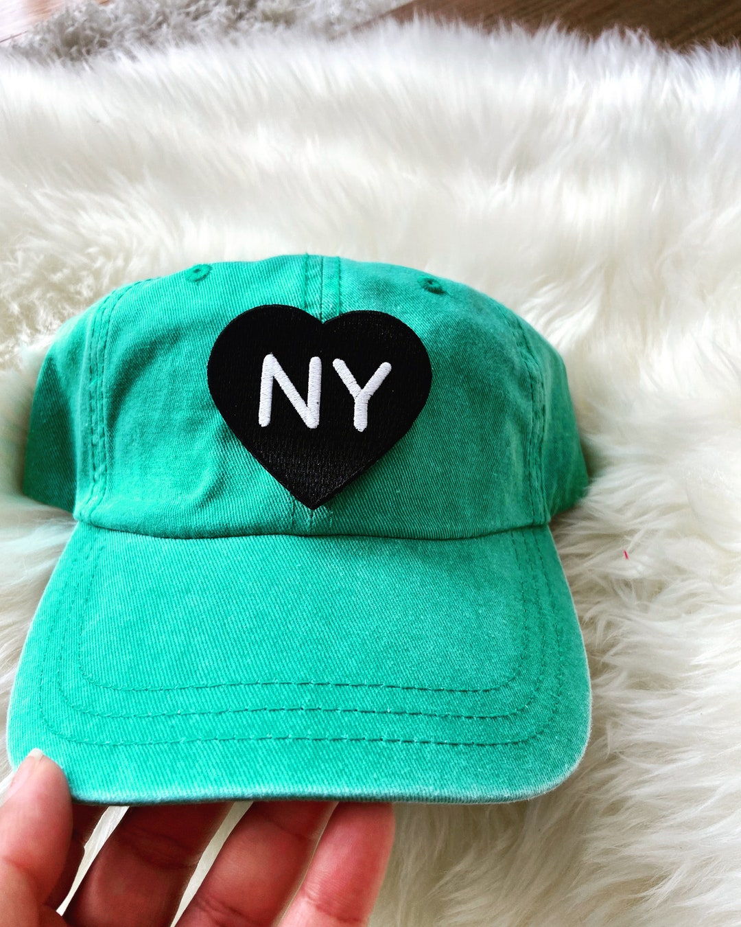 green nyc hat