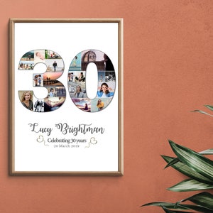 May include: A white framed photo with a collage of photos in the shape of the number 30. The text "Lucy Brightman Celebrating 30 years 20 March 2019" is below the collage.