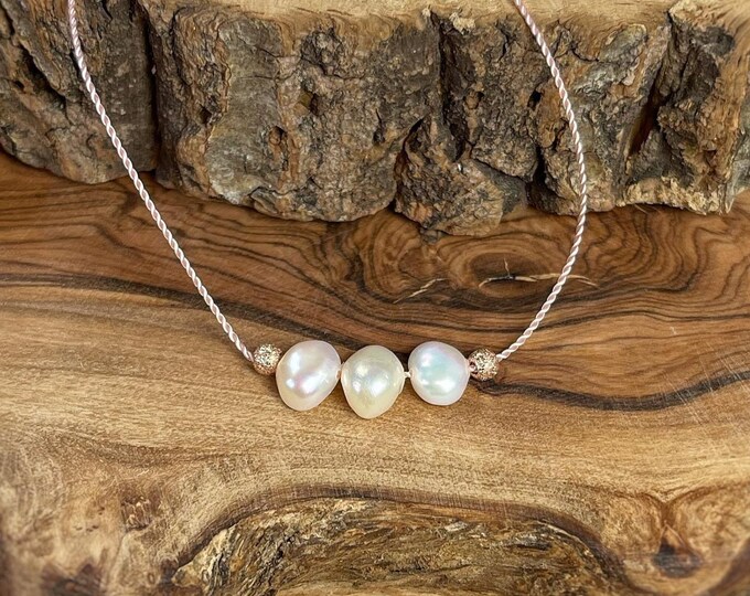 Freshwater Pearl Necklace: Natural Silk Cord, Sterling Silver Clasp