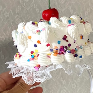 White fake cake, confetti cake hat, rainbow sprinkles party headband