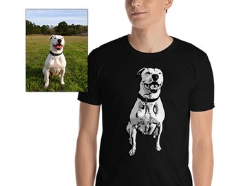 May include: A black t-shirt featuring a white silhouette of a dog sitting against a black background.
