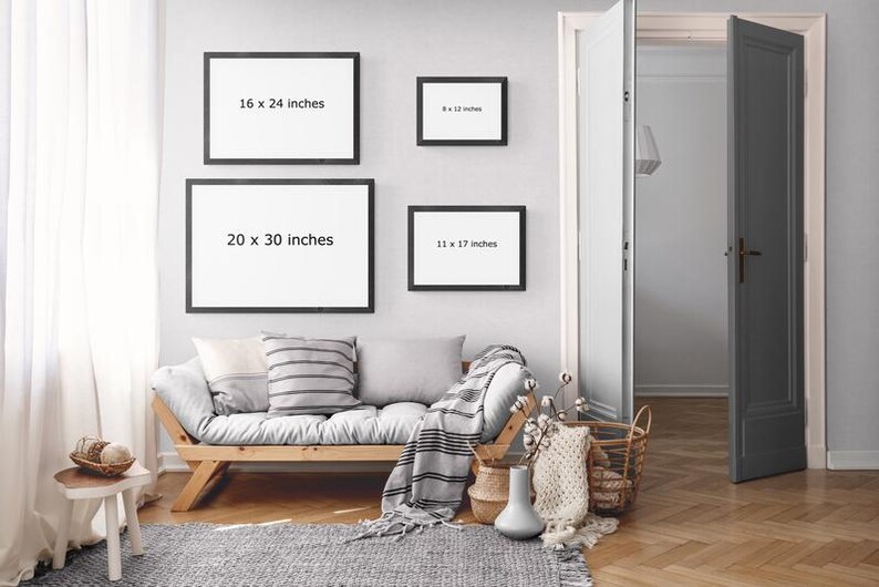 a living room with a couch and pictures on the wall
