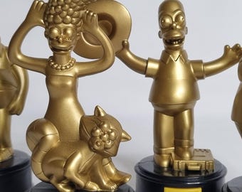 Set of 4 Golden Figurines “The Simpsons Movie”, Matt Groening, Special Burger King Edition (Spanish voice)