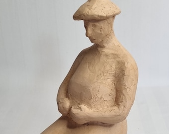 Silhouette of a seated woman, terracotta sculpture signed B. Escoffier