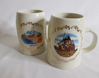 Set of two vintage "holiday souvenirs" cups or mugs