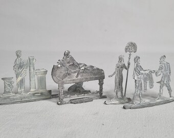 Juego de 14 platos de peltre sin pintar – Figuras inspiradas en la