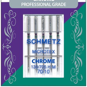 May include: A package of 5 chrome-plated Microtex sewing machine needles, size 130/705 H-M and 70/10, by Schmetz. The needles are packaged in a clear plastic case with a white label.