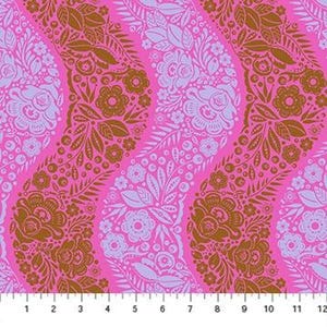 May include: A fabric featuring a repeating wave pattern of floral and leaf motifs in brown and light purple on a bright pink background, positioned above a white ruler showing 12 inches for scale and precise measurement.
