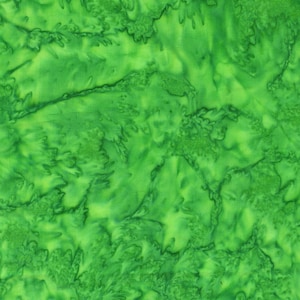 May include: A vibrant green fabric featuring a mottled batik pattern with darker and lighter shades of green creating an organic, textured appearance across the surface of the material, showcasing a consistent dye effect throughout the textile.