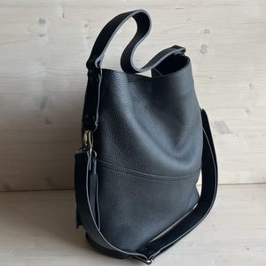 Oversized Black Leather Hobo Bag: side of the bag
