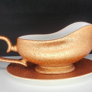 Bronze swirls gravy boat And plate