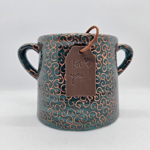 Emerald green and bronze utensil jar with handles