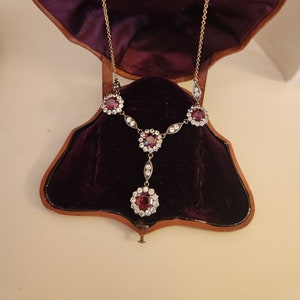 Antique 10 K gold and silver Garnet and clear stone Lavalier necklace