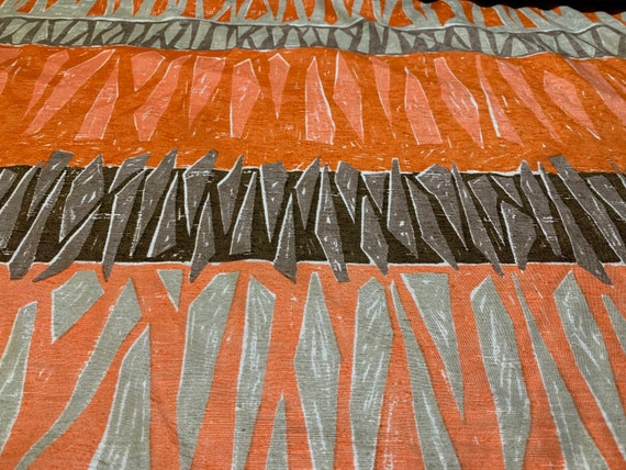 Dupioni silk Super slinky orange, melon, brown and tan tribal print pure silk with turquoise back.