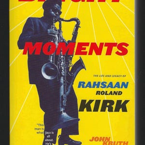 May include: Book cover with a yellow background and the title "BRIGHT MOMENTS" in red. The image features a silhouette of a musician playing a saxophone. The text "RAHSAAN ROLAND KIRK" is also visible.