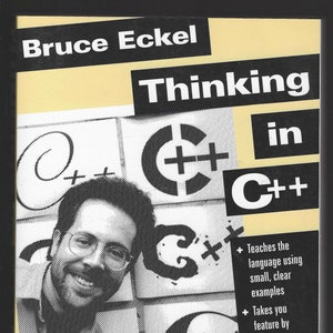May include: A book cover with a black and white photo of a man with a mustache and glasses. The title of the book is "Thinking in C++" by Bruce Eckel. The cover also features the C++ logo and text describing the book's features.
