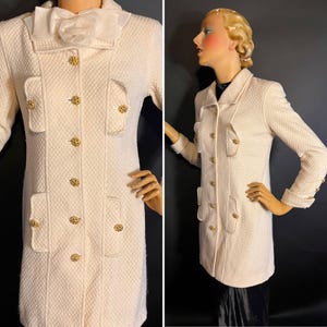 1990s Chanel Cream Waffle Weave Wool Coat or Dress with Collar, French Cuffs, Gold Buttons, Four Vertical Pockets, Mid Thigh Length