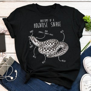 May include: Black t-shirt with a white graphic of a hognose snake with the text "Anatomy of a Hognose Snake" and a diagram labeling the snake's body parts.