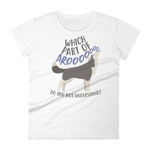 May include: White t-shirt with a cartoon husky dog howling with the text "Which part of AROOOO... do you not understand?"