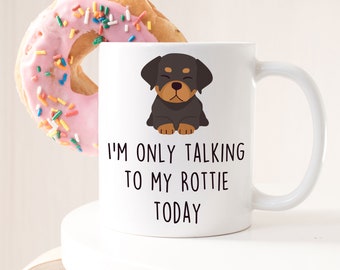 May include: White ceramic coffee mug with a black and brown Rottweiler puppy illustration and the text "I'm only talking to my Rottie today".