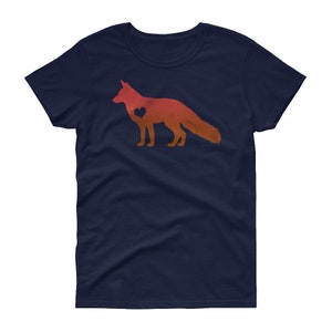 May include: A navy blue women's t-shirt with a red and orange silhouette of a fox with a heart in its chest.
