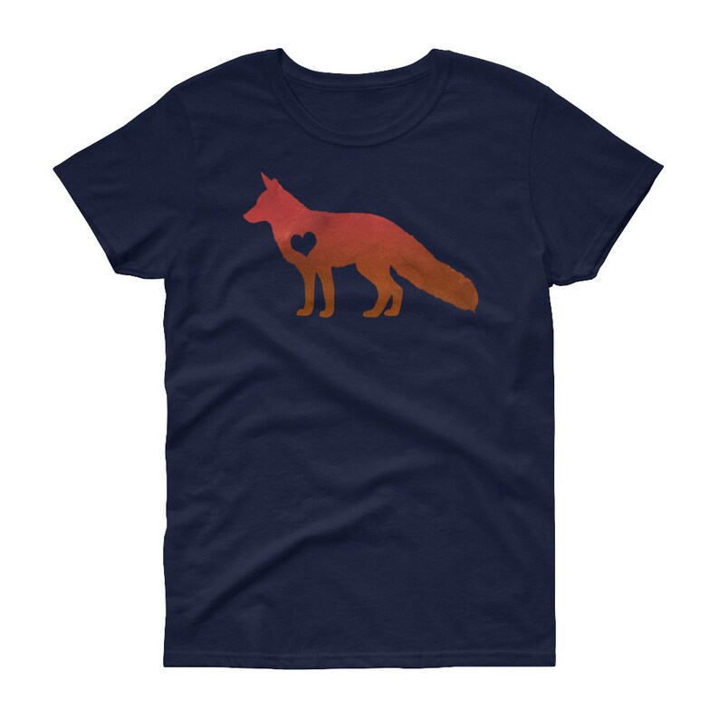 May include: A navy blue women's t-shirt with a red and orange silhouette of a fox with a heart in its chest.