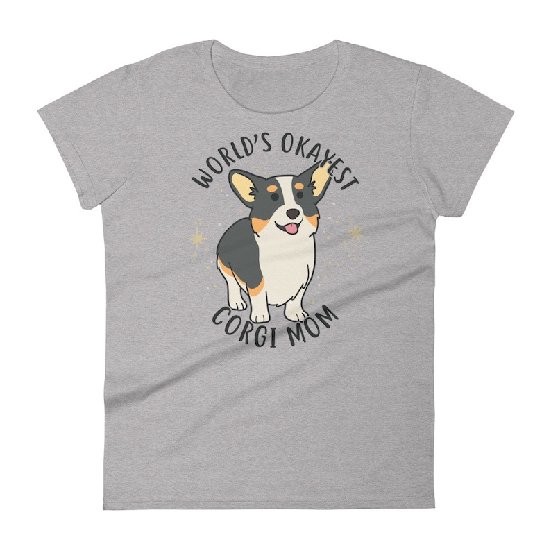 May include: Gray t-shirt with a cartoon corgi dog and the text "World's Okayest Corgi Mom".