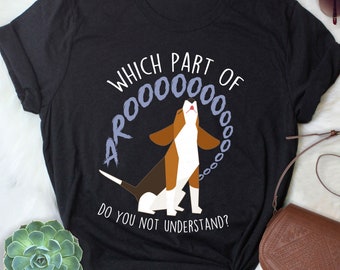 May include: Black t-shirt with a white graphic of a dog howling with the text "Which part of AROOOOOO do you not understand?"