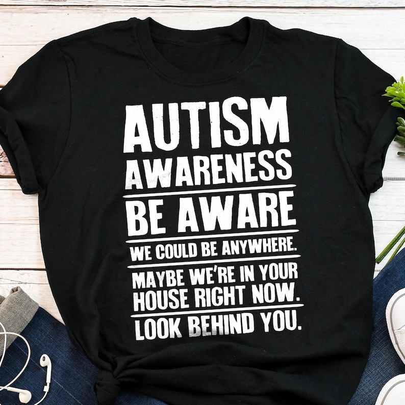 a t - shirt that says autism awareness be aware